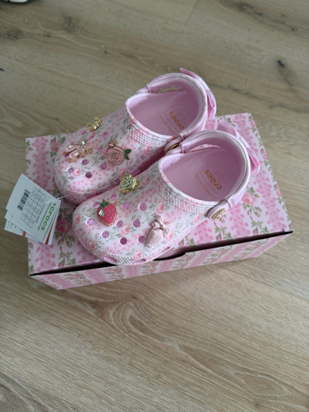 CROCS Pink Floral Kids' Clogs with Charm Accents